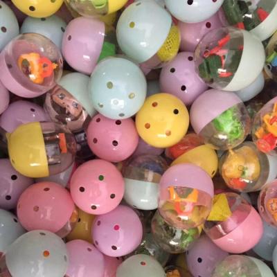 China Small oval plastic egg toy surprise gashapon vending machine capsule toys for kids game for sale