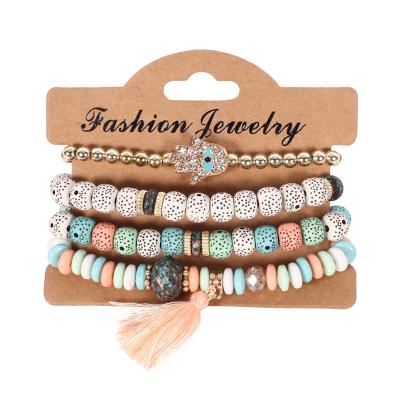 China New Wholesale BOHEMIA 4pcs/set Multilayer Natural Stone Mix Bead Tassel Pendant Bracelet Set For Women for sale