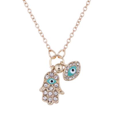 China CLASSIC Alloy Crystal Hamsa Hand Turkey Blue Enamel Eyes Silver Gold Pendant Necklace Unique Accessory for sale