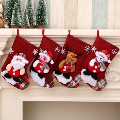 China Eco-Friendly Christmas Stockings 4Pieces Set 9 Inch Santa Wapiti Snowman Bear Fireplace Cute Plush 3D Applique Stocking for sale