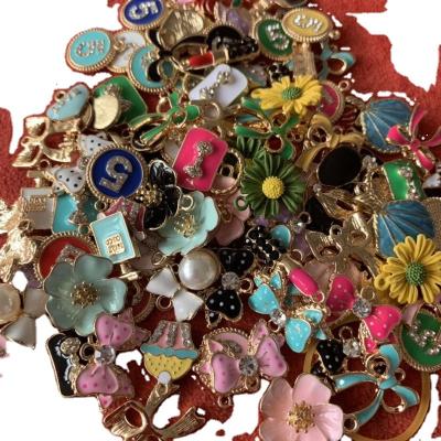 China 100pcs cute per various lot color enamel charms mix cute flower bow bag metal alloy charm mix for bracelets color enamel charms mix for sale