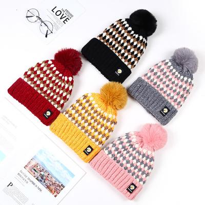 China New Thick Hot Lady Wholesale COMMON Knit Hts With Pom Pom From Autumn And Winter Chenille Fabric for sale