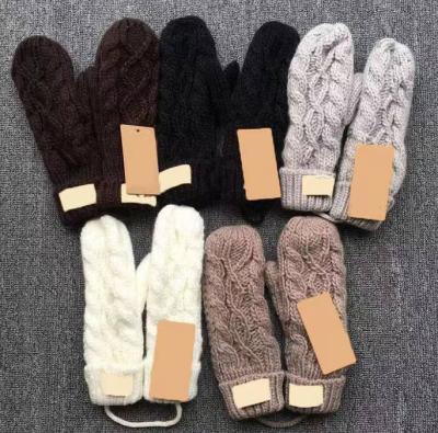 China Middle With Package Winter Brand Unisex Glove Warmer Magic Knitted Glove Designer For Men And Women for sale