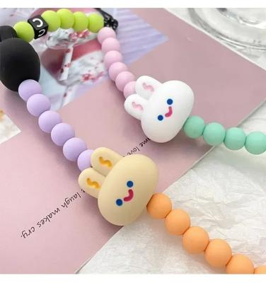 China BEAD New Rabbit Mobile Phone Chains Strap Sweet Cute Girls Bunny Acrylic Beaded Phone Charms Accessories Chaine Telephone Portable for sale