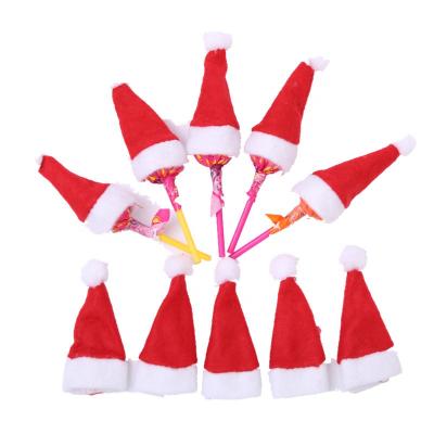 China Non Woven Christmas Natural Material Mini Christmas Decoration Lollipop Hat Santa Hats for sale