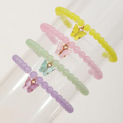 China XUFANG cute 4pcs sets wholesale 2022 new kids bracelets cartoon acrylic butterfly girls pendent beaded bracelets for sale