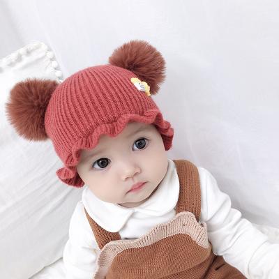 China XUFANG Hot Selling Wholesale Baby Dobby Knitted Hats Solid Color Beanies Winter Warm Pom Pom Hats For Toddler for sale