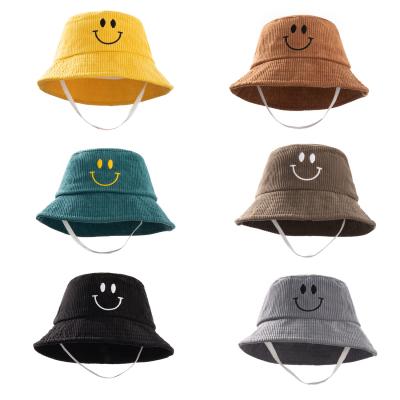 China XUFANG 2021 New Solid Color Letter Smiley Embroidered Winter Hats Children's Corduroy Bucket Hats for sale