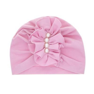 China XUFANG Dobby New Arrival Fashion In Crest Running Pearl Headwear Baby Hats Solid Color Newborn Fetal Infant Turban Hats for sale