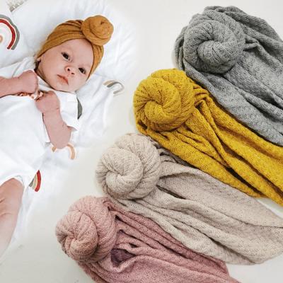 China New XUFANG Dobby Fashion Kids Covers Solid Color Waffle Knitted Yarn Hood Snail Shape Baby Turban Comfortable Hats for sale