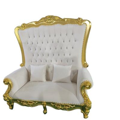 China 2023 modern wooden luxury gold rental cross back chair for wedding for sale