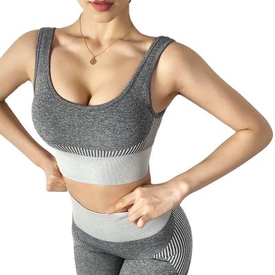 China 2021 Newest Women Sports Fitness Yoga Bra Top Breathable Seamless Gym Padded Bra Lift Up Running Back Shockproof Cross Sports Strappy Bra for sale