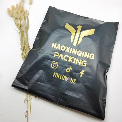 China Customized High Quality Strong Adhesive Printing Black Logo Plastic Shopping Bag For Clothes for sale