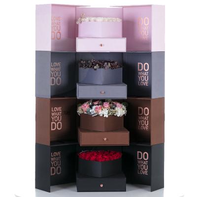 China Wholesale Recyclable Eco-Friendly Paper Custom Paperboard Packaging Box Flower Certificate Cube Magic Cube Caja De Flores Gift Box for sale