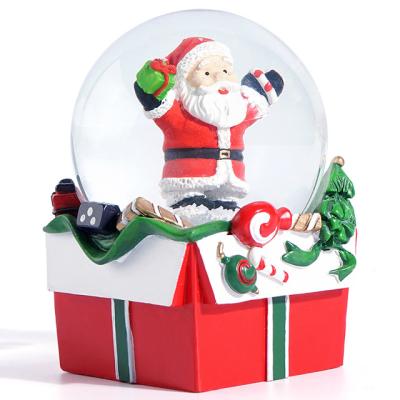 China Handmade Carved Hand Painted Resin Christmas Water Ball for sale