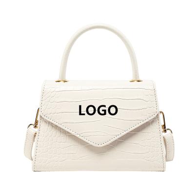 China Fashion soft PU bags women handbags 2021 ladies bag below retro solid color ladies handbags fashion design tote handbags for sale