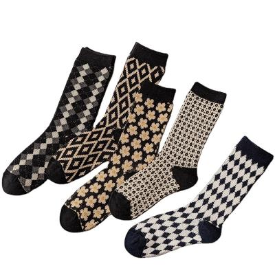 China Breathable Knitted Black Color Series Plaid Socks Women Sporty Cotton Ladies Booties Medium Tube Socks for sale