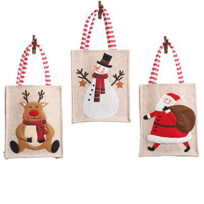 China Fashion Eco-friendly Canvas Cartoon Santa Claus Mini Cloth Christmas Gift Candy Sack Embroidery Tote Bag for sale