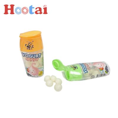 China Fruit Yogurt Ball Tablet Candy Cartoon Toys Squeezed Candy for sale