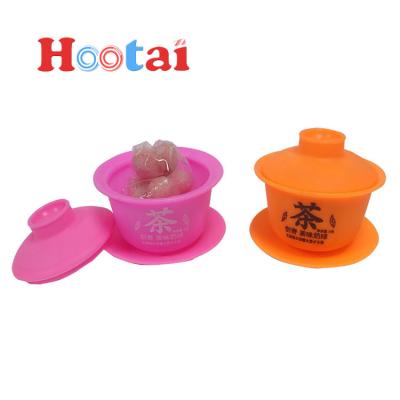 China Natural Candy Toys Promotional Plastic Kungfu Tea Cup Toy Candy With Strawberry Orange Hard Candy for sale