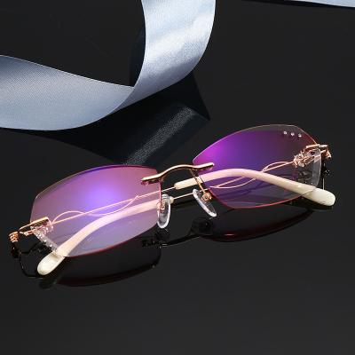 China Retractable Rectangle Rimless Pink Gold Metal Frame Readers Glasses Reading Glasses DLR1203 For Women for sale