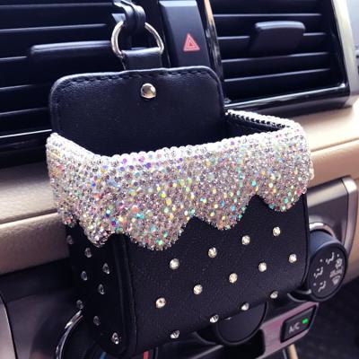 China Diamond Crystal Car Organizer Air Vent Bag Phone Holder Pocket Bling Faux Stone Car Hanging Leather Accessories 6*6.5cm for sale