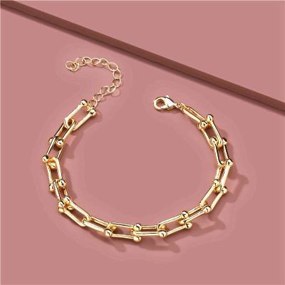 China U-shaped lock 18K gold titanium steel women's bracelet high quality point bracelet hip-hop style stitching thick chain bracelet women for sale