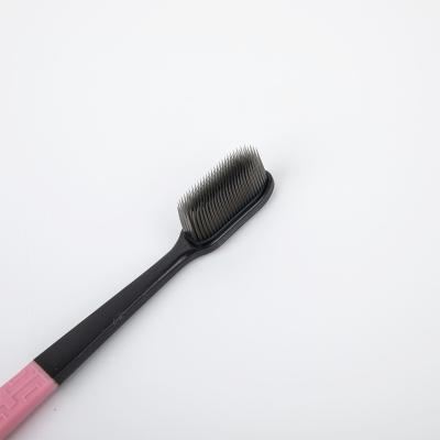 China Durable High Quality Charcoal Type Hard Stiffens Black Toothbrush for sale