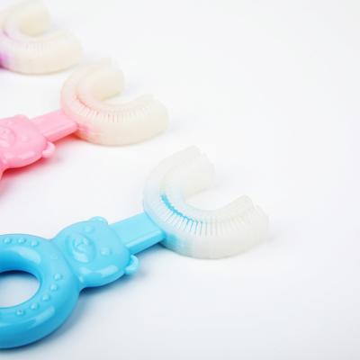 China Durable Type New Trend 360 Children U Shape Manual Toothbrush Children U-shape Baby Silicone Toothbrush 36 for sale