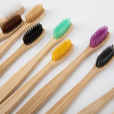 China 100% Travel Disposable Biodegradable Green Bamboo Charcoal Toothbrush Adult Toothbrush Durable Type for sale