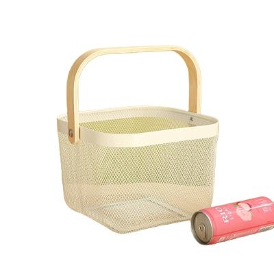 China Nordic viable light luxury iron art portable shopping basket wooden handle rolled edge style fruit and vegetable basket household hollo for sale