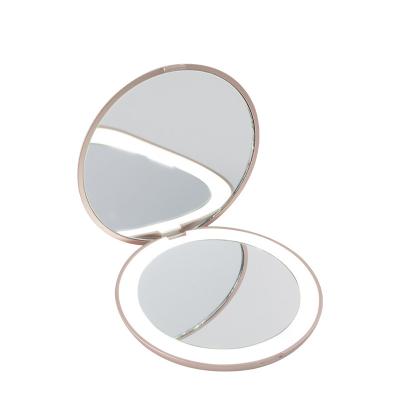 China Amazon 2x Magnification Hot Girl Lighted Make Up Around Pocket Mini Led Mirror For Gift Handheld Makeup for sale