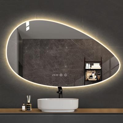 China Waterproof Irregular Smart Mirror Wall Touch Screen Bathroom Lighted Glass Mirror With Led Light for sale