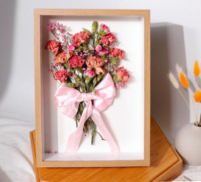 China Abstract Custom Living Room Decoration Photo Frame Wooden Flower Photo Frame Wall for sale