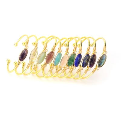 China Fashionable Wholesale Adjustable Gold Wire Wrap Bracelet Natural Oval Crystal Colorful Tree Of Life Bangle For Women Girls for sale