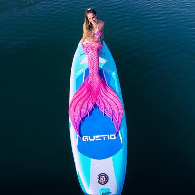 China GUETIO Water Sports Fast Shipping Adventure Traveling Soft EVA SUP Inflatable Stand Up Paddle Board Non-Slip Top Surfing Board for sale