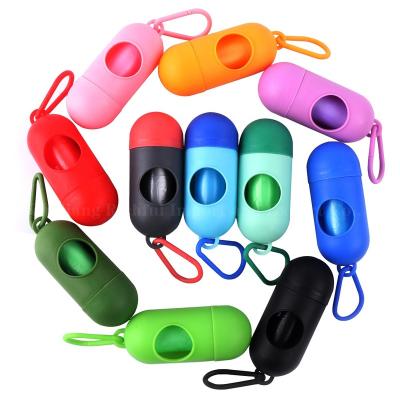 China Stored Dog Poop Bag Dispenser Capsule Form Portable Multi Color Pet Waste Bag Holder for sale