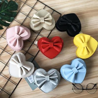 China 2021 Fashion Little Girl PVC One-Shoulder Chain Bag Mini Colorful Cute Bow Child Purses And Laser Handbags Small Girl PVC Handbags for sale