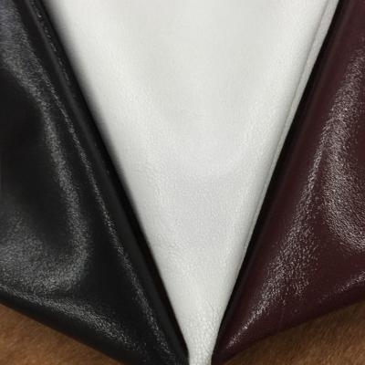 China Wrinkle Resistant Tricolor Goatskin Pattern Top Layer Cracked Leather Genuine Leather for sale