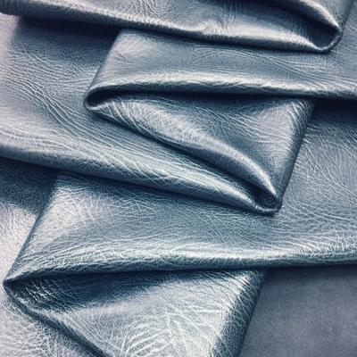 China Emerald Light Series Heavy Duty Dark Blue Oil Waxed Genuine Leather 700# Pattern Wrinkle Goatskin Top Layer Leather for sale