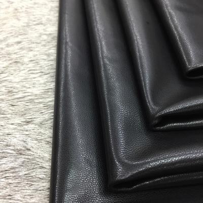 China Wrinkle resistant grade A black vegetable tanned leather special thin section in clothing genuine leather factory direct sales for sale