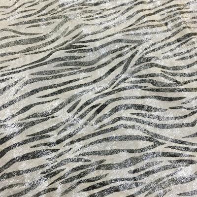 China Wrinkle Resistant Zebra Stripe Tan And Silver Plating Horsehair Printed Genuine Leather Apparel Leather Ornament New For Luggage for sale