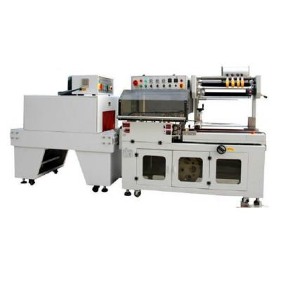 China Automatic Shrink Wrap Food Factory Price Plastic Foil Box Shrink Paper Packaging Machine For E-commerce for sale