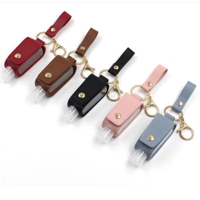 China Wholesale Custom Classic Neoprene Gel Belt Mini Tassels 30Ml Travel Spray Bottle Key Chain Portable Hand Sanitizer Holder for sale