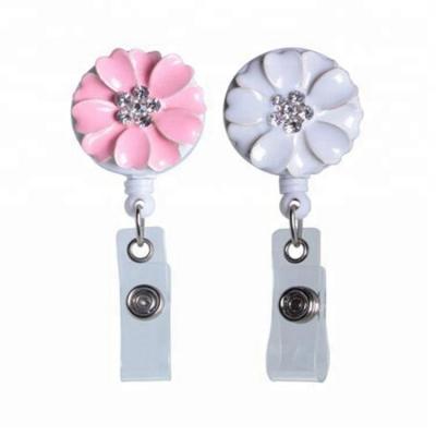 China We can OEM. beautiful flower badge retractable reel for sale