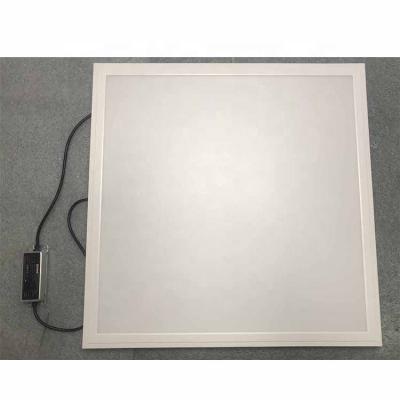 China Modern Waterproof IP65 Ceiling Surface Mounted Backlit 600x600 Enclosed Square Led Panel Light for sale