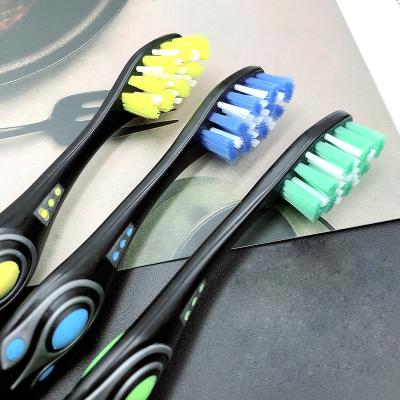 China Profile Hole Adorning With Bristle Mechanical Conical Grinding Dental Spots Remove Black Bristle Extra Hard Plastic Manual Toothbrush for sale