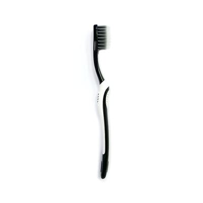 China Streamlined Hole Stiffens Design With Binchotan Particles Size A Soft Streamlined Hole Stiffens Design With Binchotan Particles Adult Toothbrush OEM With Factory Price for sale