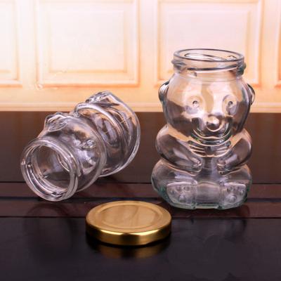 China Freshness Preservation 280ml Candy Animal Transparent Glass Jar Food Candy Jar Cartoon Bear Shape Glass Honey Jar for sale