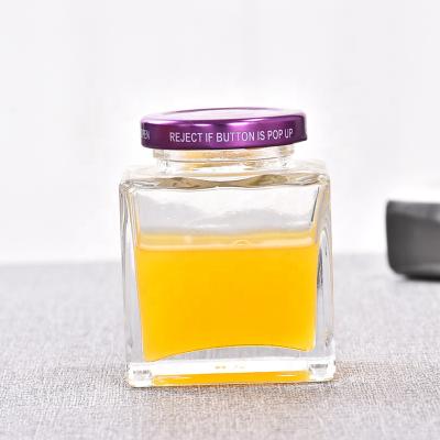 China 100ml Small Flat Square Glass Honey Jar Stocked Glass Jar For Honey Jam Standard Glass Jars With Lids for sale